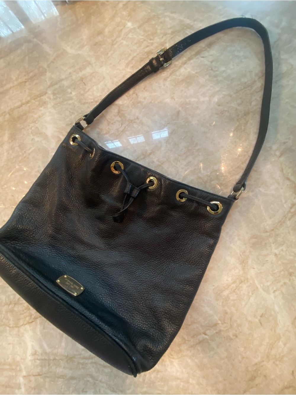 Micheal Kors Pebbled Leather Black Drawstring Leather Handbag